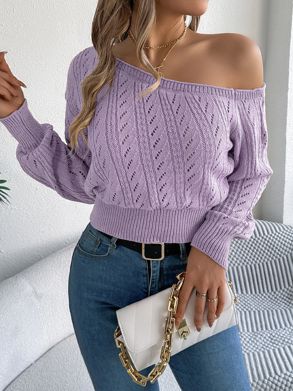 Elegant women's casual long-sleeved sweater with off-the-shoulder neckline