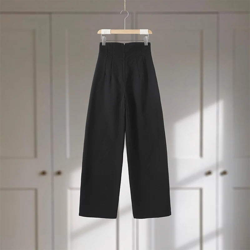 Classic women's outfit with blazer and trousers