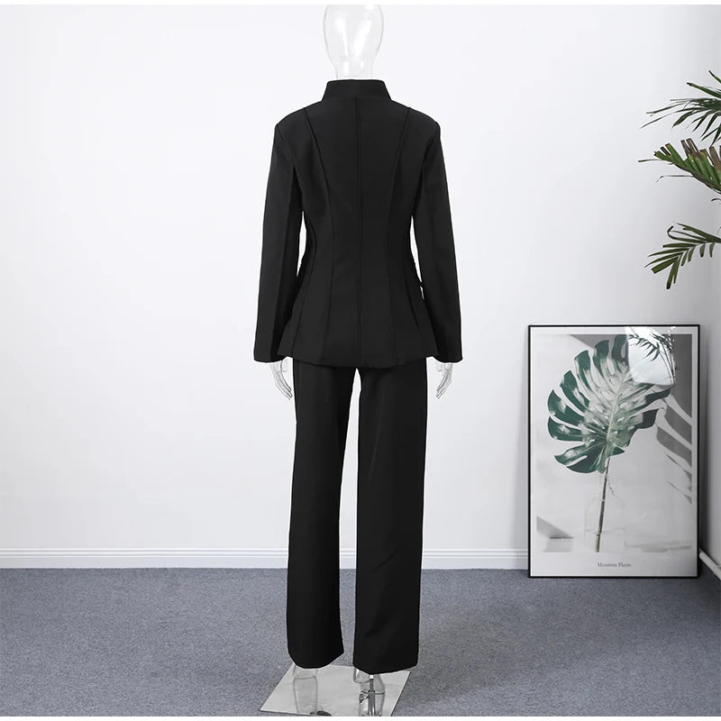 Classic women's outfit with blazer and trousers