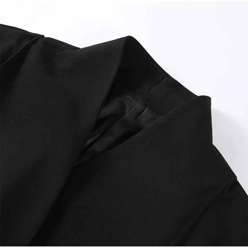 Classic women's outfit with blazer and trousers