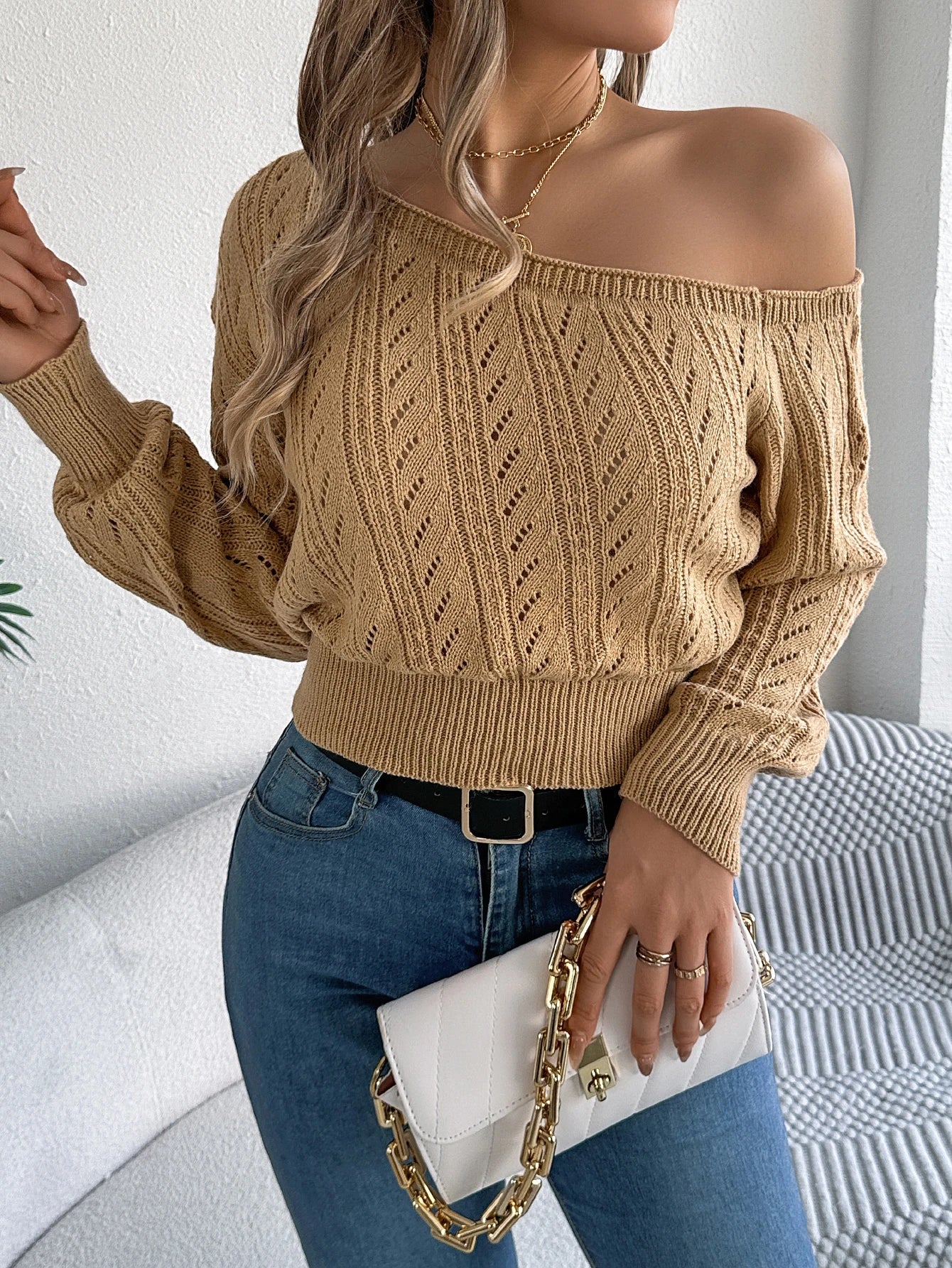 Elegant women's casual long-sleeved sweater with off-the-shoulder neckline