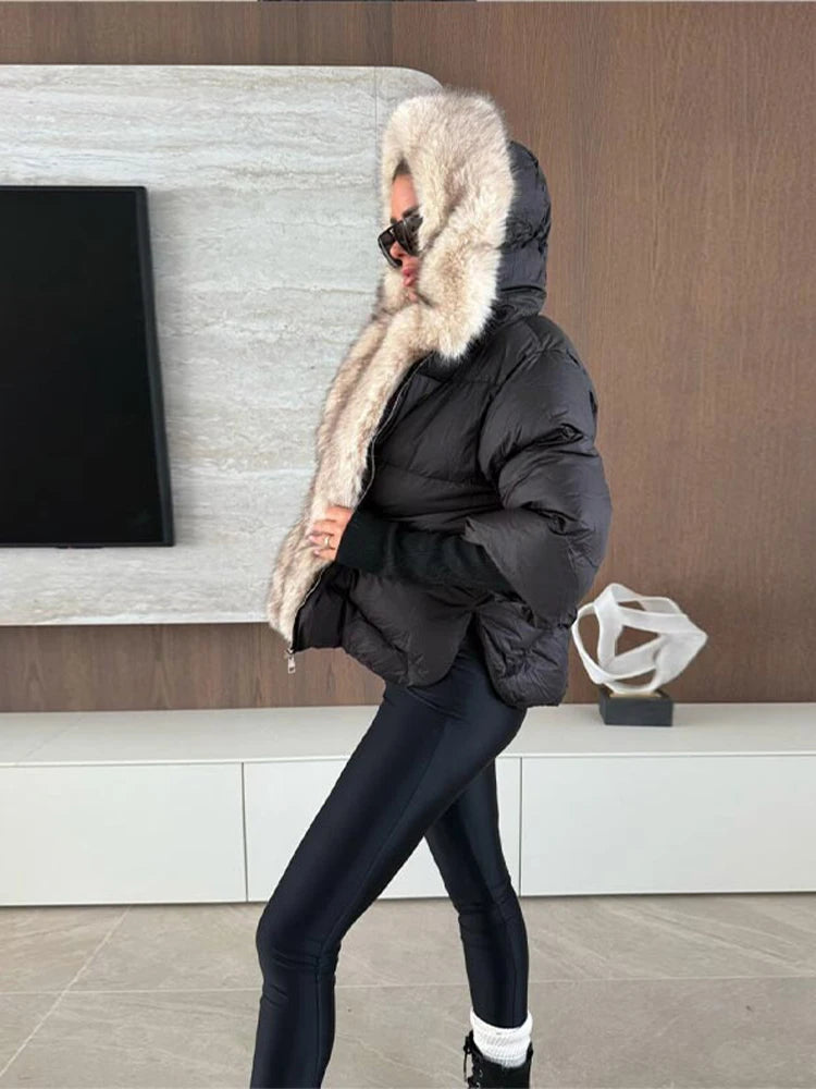 Women's hooded coat with faux fur details and knit cuffs