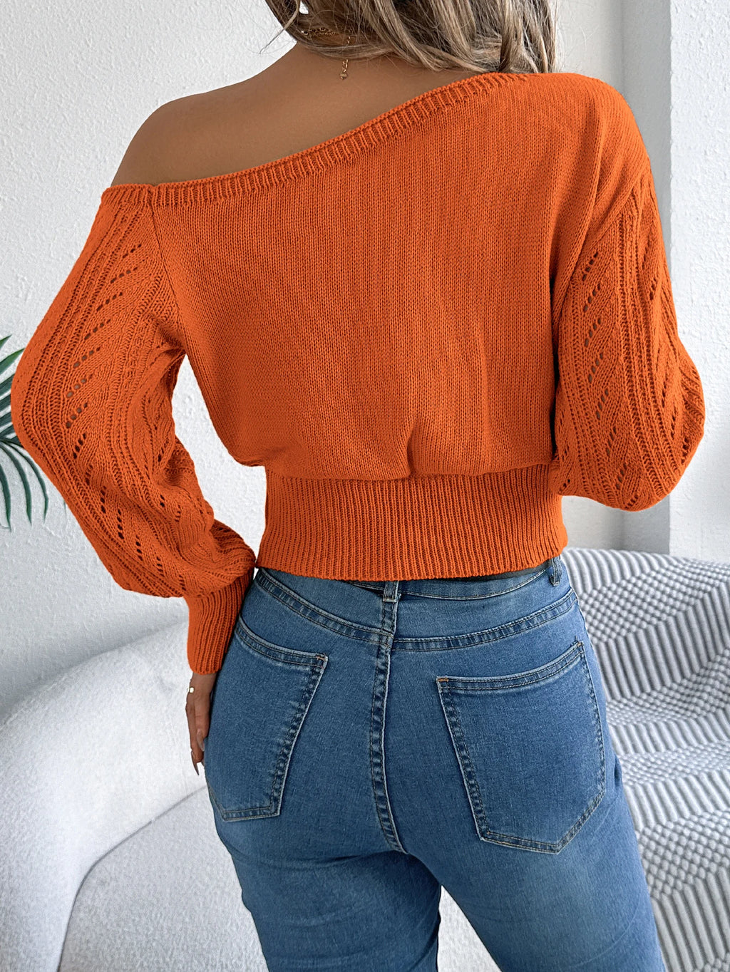 Elegant women's casual long-sleeved sweater with off-the-shoulder neckline
