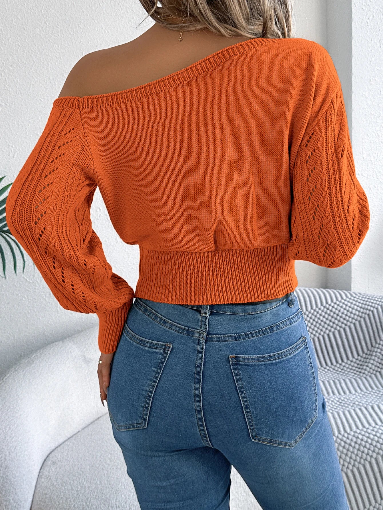 Elegant women's casual long-sleeved sweater with off-the-shoulder neckline